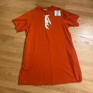 NWT Umgee orange dress with lace up detail in the front